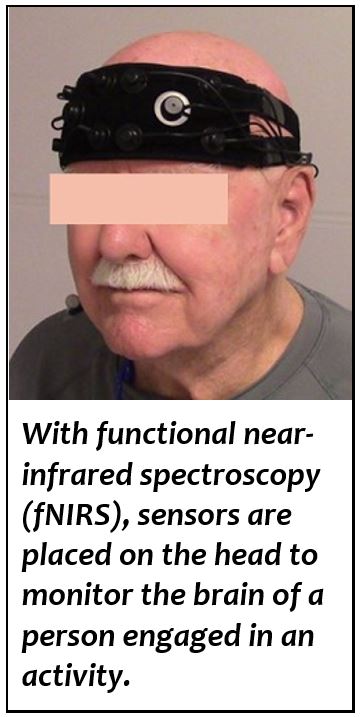 Man with fNIRS sensors on his head